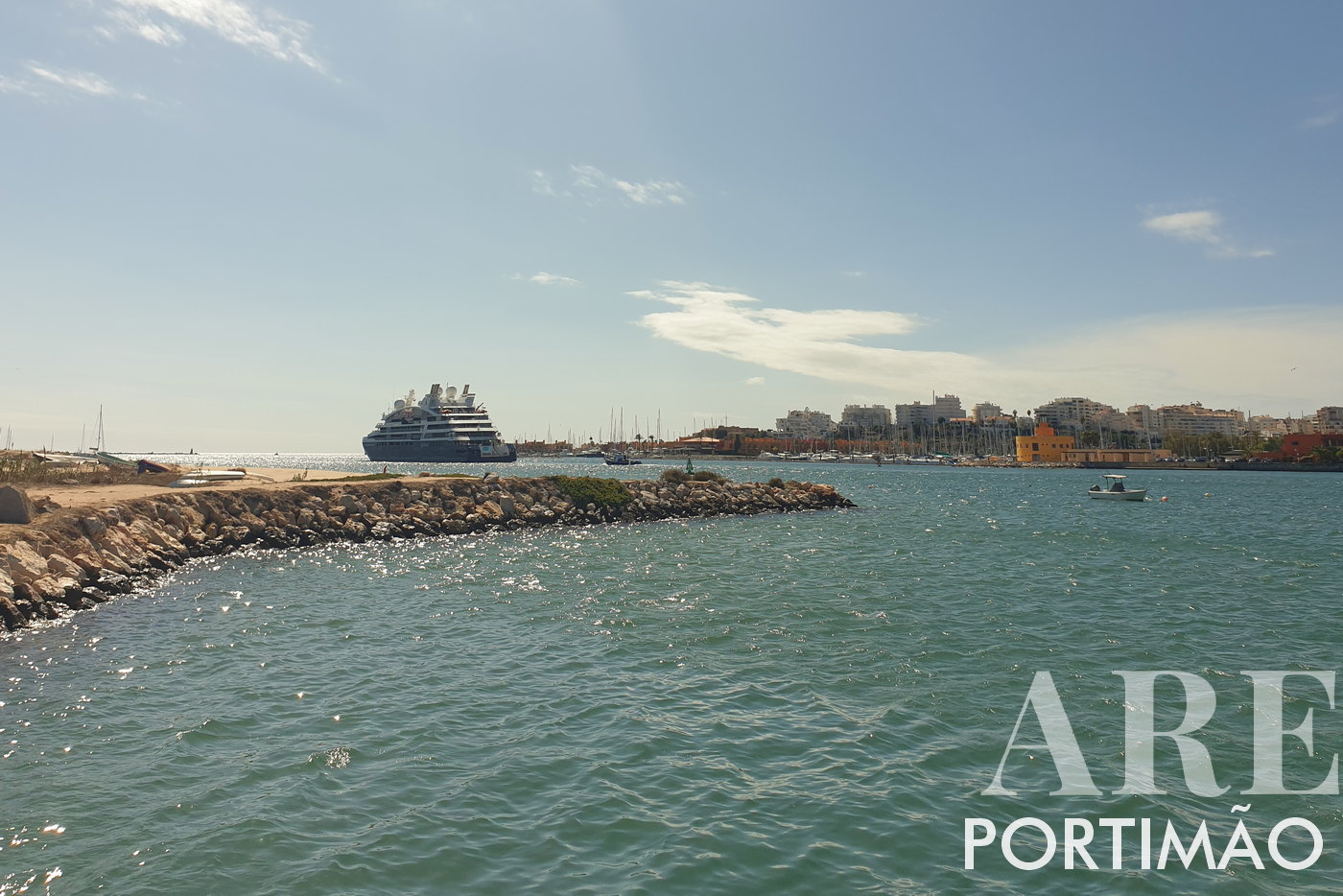 Portimão Marina with departing cruise ship
