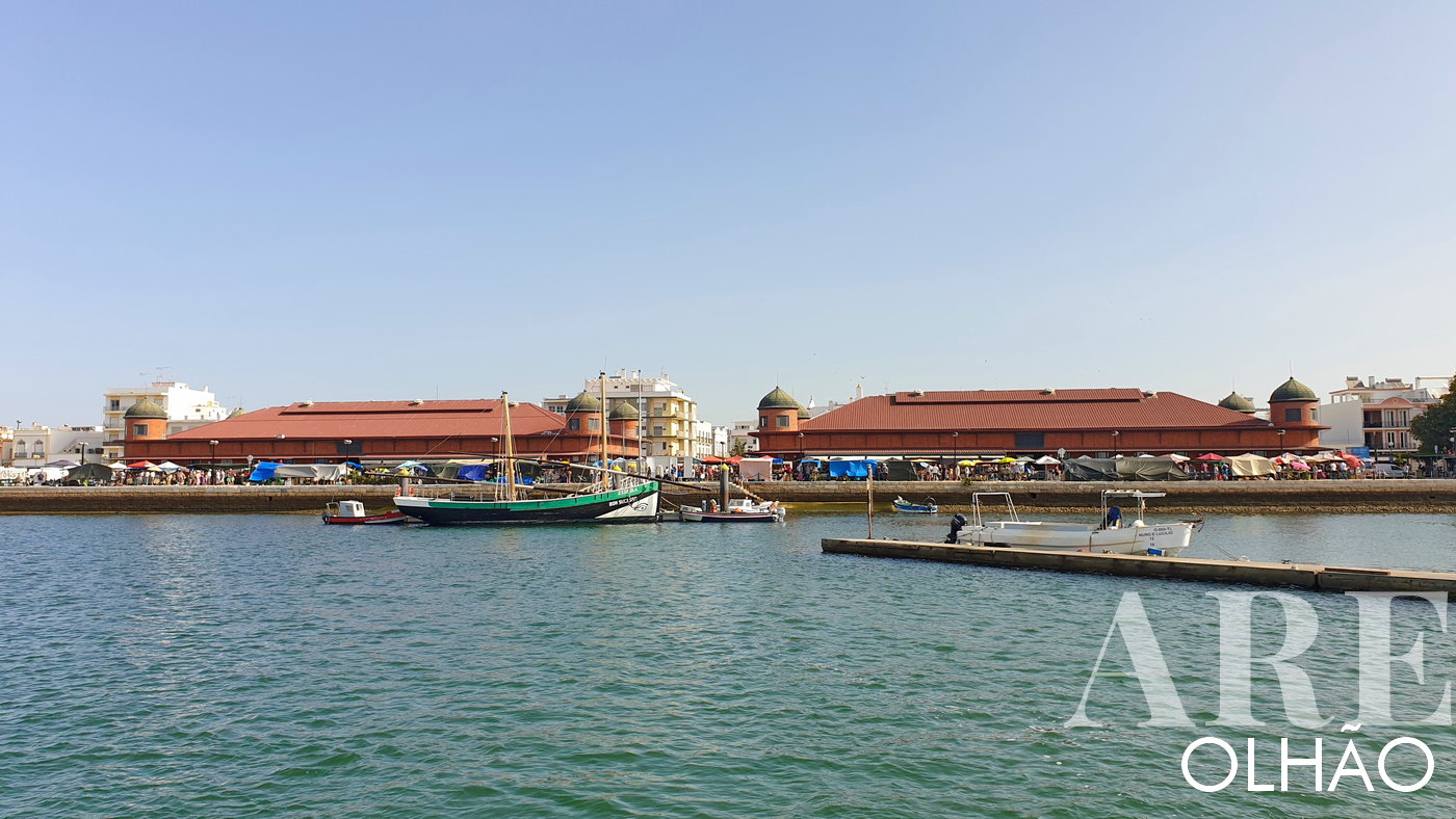 View of the Caíque Bom Sucesso and the market building from the Ria Formosa