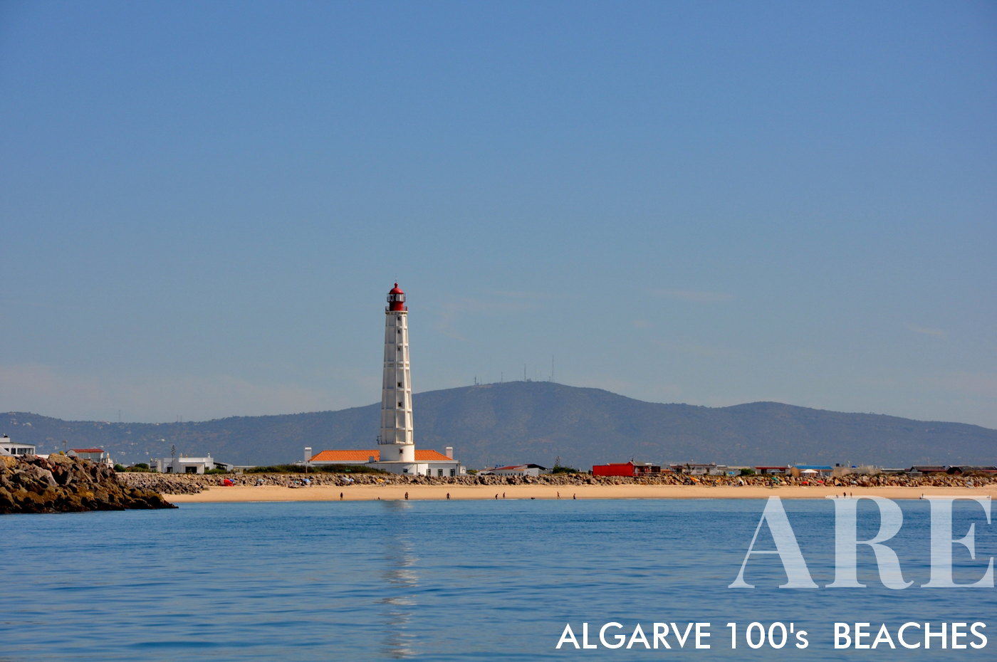 Farol Beach, located on Culatra Island in the Ria Formosa Natural Park near Faro. Farol Beach is named after the picturesque lighthouse, Farol do Cabo de Santa Maria, which stands proudly on the island. The lighthouse adds to the charm of the beach and serves as a landmark for visitors.