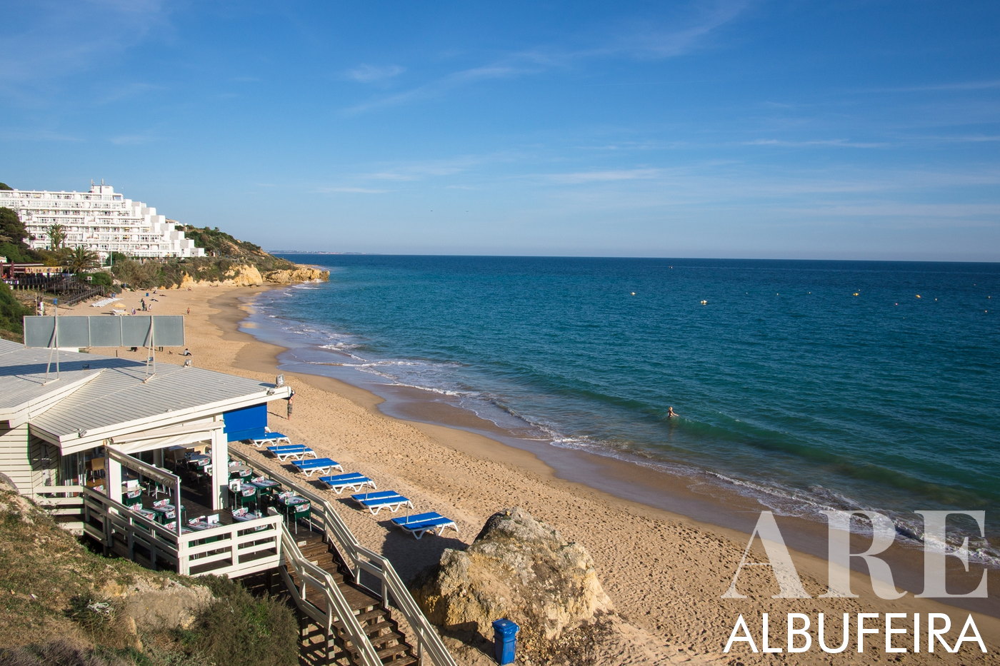 Peaceful and serene scene of Oura Beach in Albufeira, captured in the gentle light of March