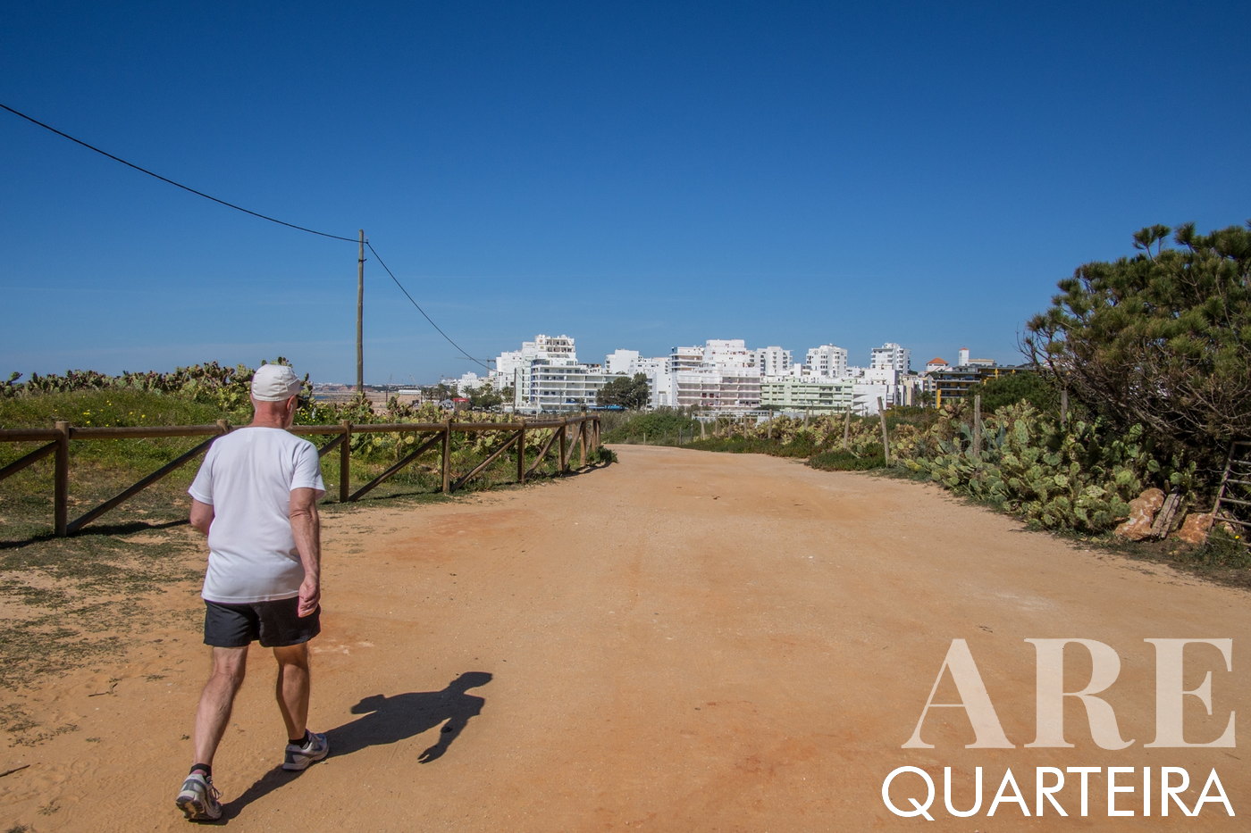 Jogger on a Trail at Cavalo Preto - Forte Novo, Eastern Quarteira