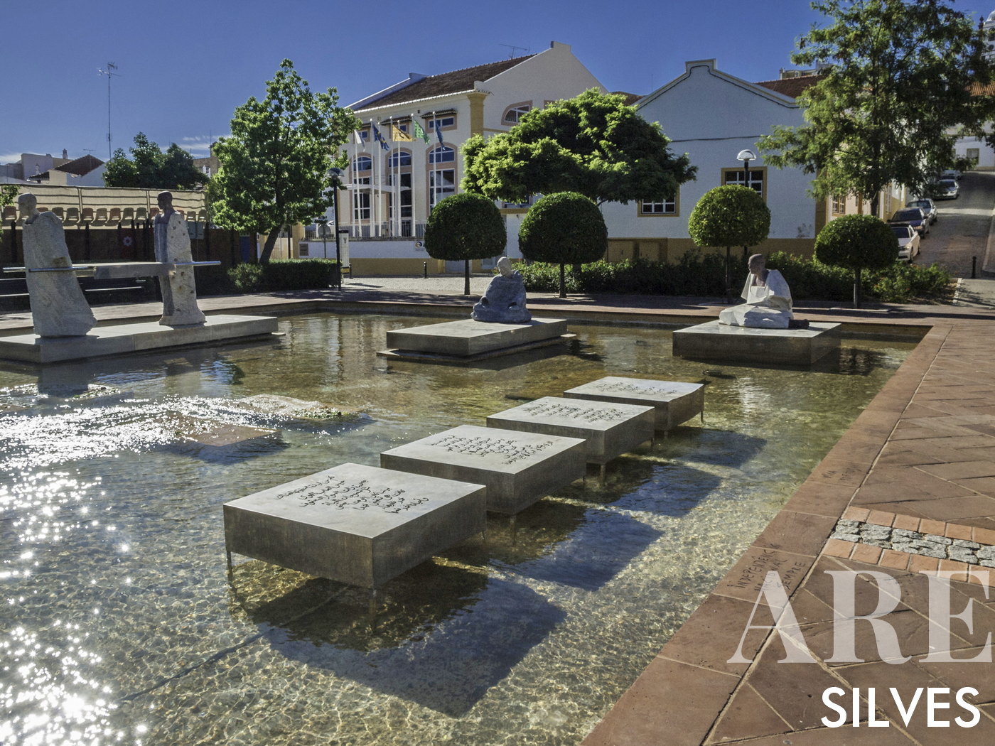 Al-Mutamid Square's Reflecting Pool and Sculpture